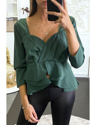 Blouse verte péplum à col et dos plongeant. - 2