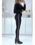 Pantalon slim noir à taille haute et bandes et perles sur les côtés - 1